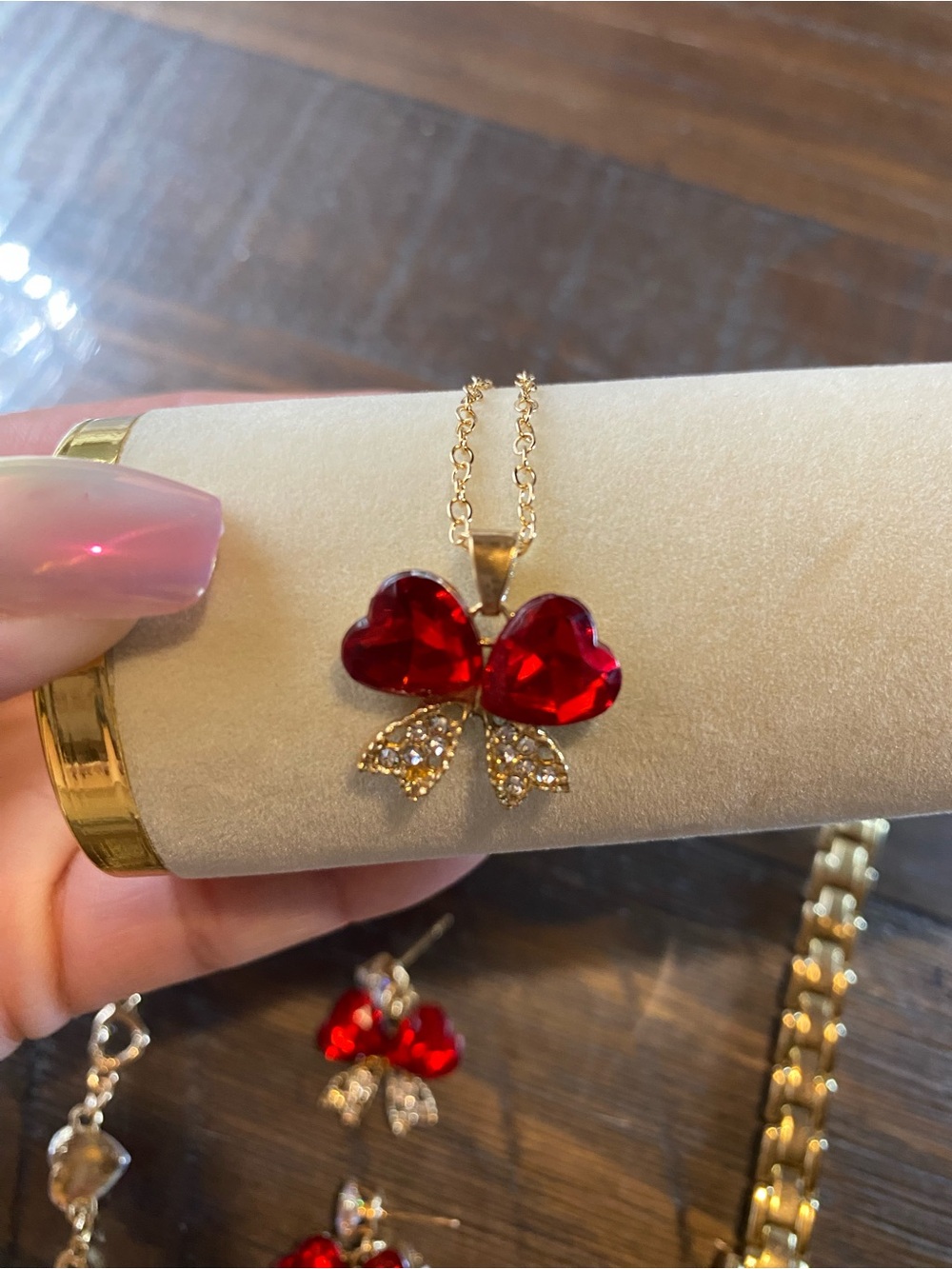 Gold-Tone Necklace with Red Heart Crystal Bow Pendant